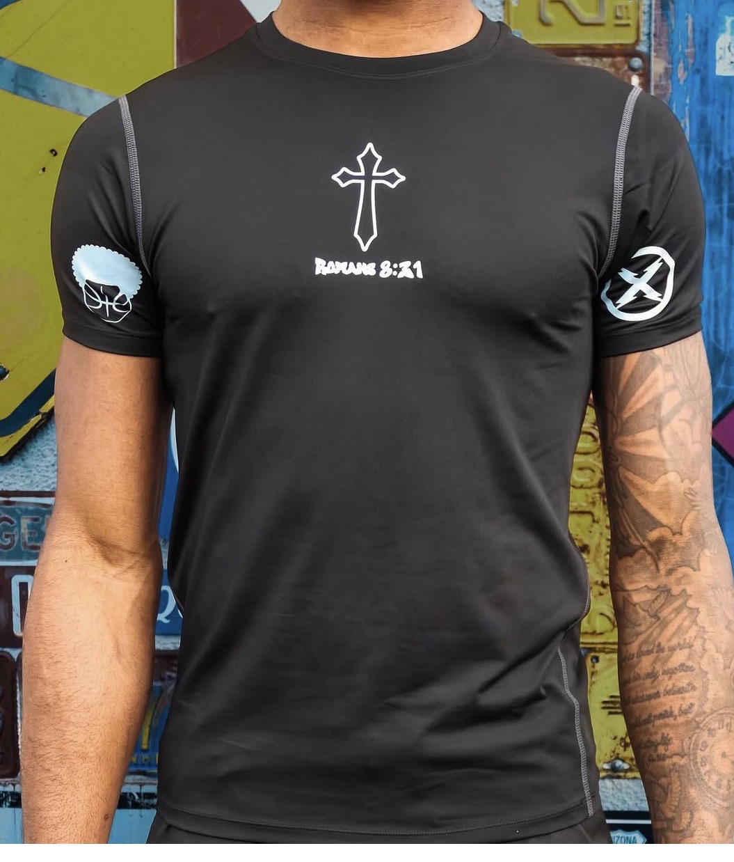 Black Ball Head Hoops compression shirt with white cross, Romans 8:31 print, and sleeve logos