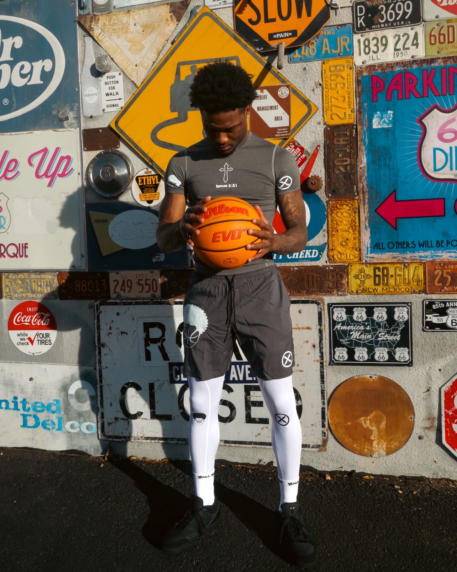 Grey BallHead compression shirt with white cross and Romans 8:31